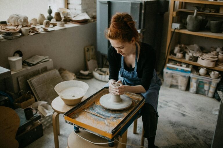A woman working in a pottery studio.